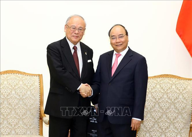 越南政府总理阮春福会见日越友好议员联盟特别顾问武部勤 ảnh 1