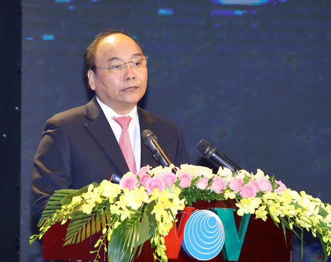 越南政府总理阮春福向越南之声广播电台授予人民武装力量英雄称号 ảnh 2 越南政府总理阮春福向越南之声广播电台授予人民武装力量英雄称号 ảnh 2