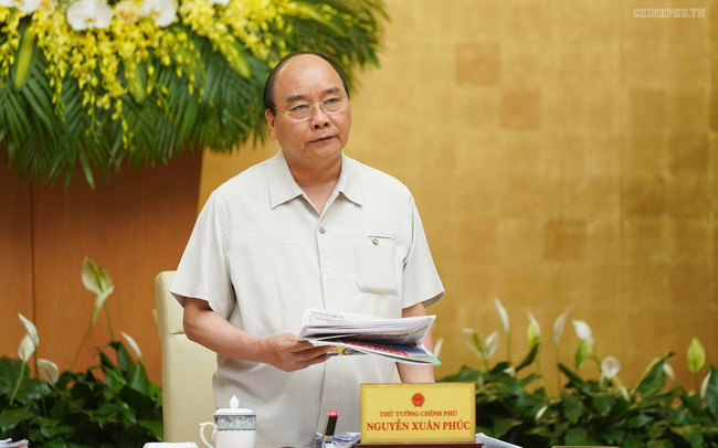 越南政府第50号决议：决不能因困难而退缩 坚持既定目标不动摇 ảnh 1