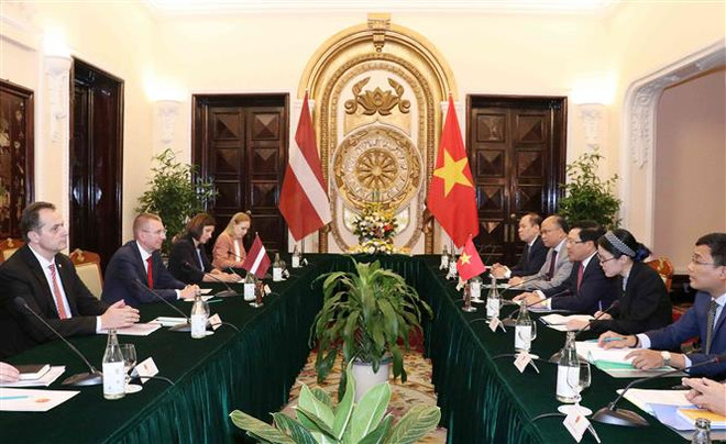 越南政府副总理兼外长范平明与拉脱维亚外长林克维奇斯举行会谈 ảnh 2 越南政府副总理兼外长范平明与拉脱维亚外长林克维奇斯举行会谈 ảnh 2