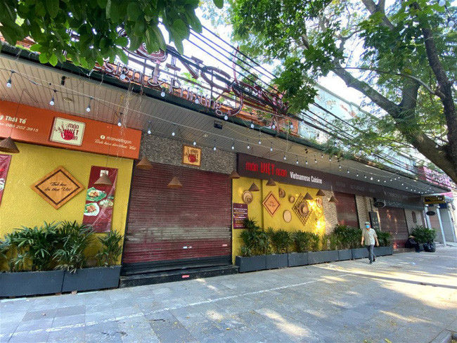 自5月4日起河内市非经营生活必须品商店每日上午9时后开店 ảnh 1