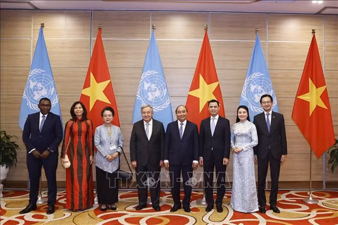 越南国家主席阮春福与联合国秘书长安东尼奥·古特雷斯主持越南加入联合国45周年纪念典礼 ảnh 3