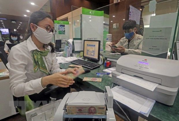 19日上午越盾对美元汇率中间价下调2越盾 ảnh 1