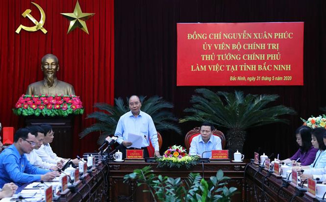 越南政府总理阮春福：北宁省要着手落实稳生产、保防疫的双重目标 ảnh 1