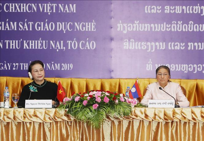 越南与老挝两国国会专题研讨会有助于提高依法治理国家的效果 ảnh 1 越南与老挝两国国会专题研讨会有助于提高依法治理国家的效果 ảnh 1