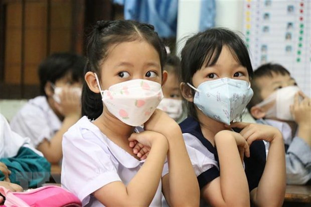 胡志明市超百万名幼儿园和小学学生正式返校上课 ảnh 1 胡志明市超百万名幼儿园和小学学生正式返校上课 ảnh 1