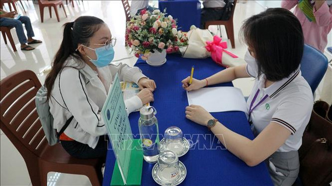 劳务市场复苏:安全灵活适应、有效控制疫情 ảnh 2 劳务市场复苏:安全灵活适应、有效控制疫情 ảnh 2
