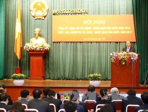 阮春福总理：财政部门应在建设服务型政府和财政机关起到带头作用 ảnh 1