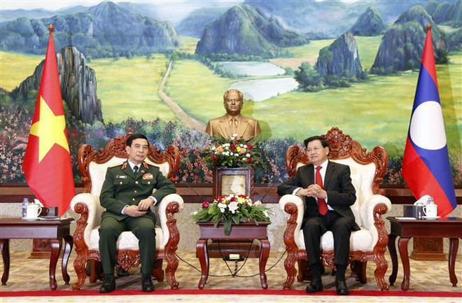 老挝党和国家领导人会见越南国防部长潘文江 ảnh 1 老挝党和国家领导人会见越南国防部长潘文江 ảnh 1