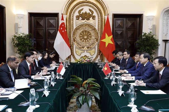 越南政府副总理黎明慨与新加坡副总理王瑞杰举行会谈 ảnh 1  越南政府副总理黎明慨与新加坡副总理王瑞杰举行会谈 ảnh 1