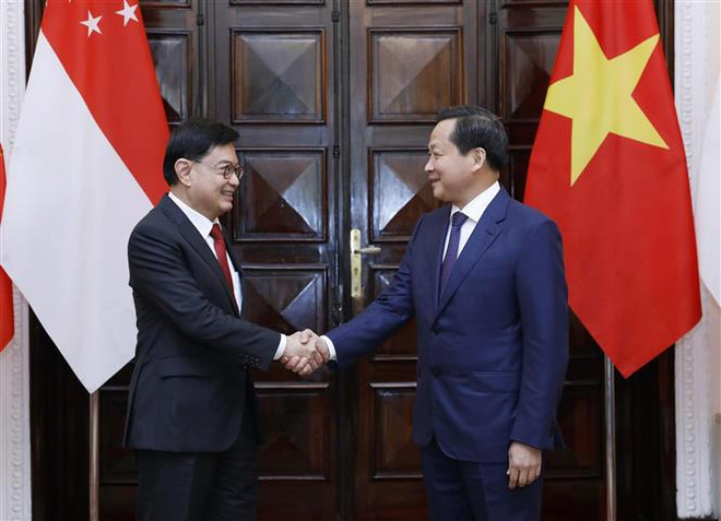 越南政府副总理黎明慨与新加坡副总理王瑞杰举行会谈 ảnh 2  越南政府副总理黎明慨与新加坡副总理王瑞杰举行会谈 ảnh 2