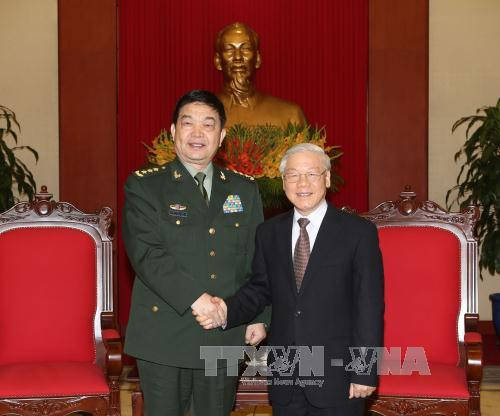 越共中央总书记阮富仲会见中国国防部高级代表团 ảnh 1