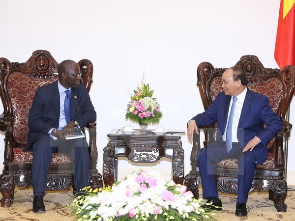 越南政府总理阮春福会见世行驻越南首席代表奥斯曼•迪奥 ảnh 1 越南政府总理阮春福会见世行驻越南首席代表奥斯曼•迪奥 ảnh 1