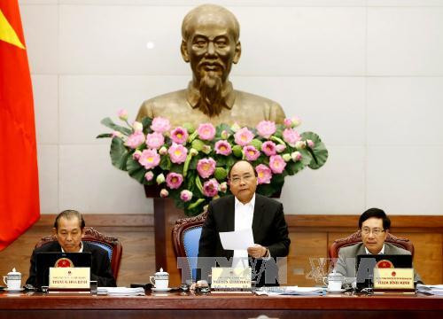 越南政府总理阮春福主持召开政府12月例行会议 ảnh 1