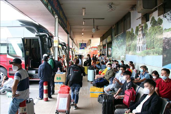 政府例行记者会：为民众返乡过年创造最为便利条件 ảnh 1