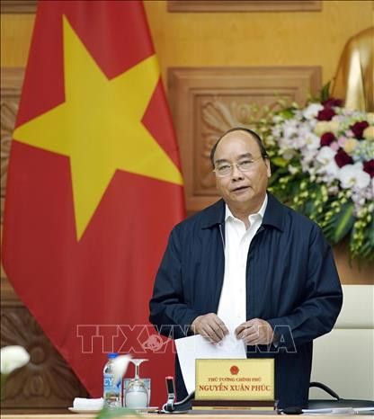 越南政府总理阮春福主持召开经济社会委员会会议 ảnh 2 越南政府总理阮春福主持召开经济社会委员会会议 ảnh 2