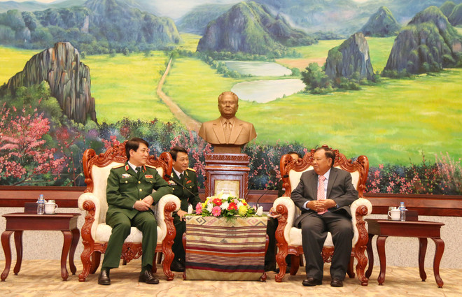 老挝领导人高度评价越老两国军队的合作结果 ảnh 1