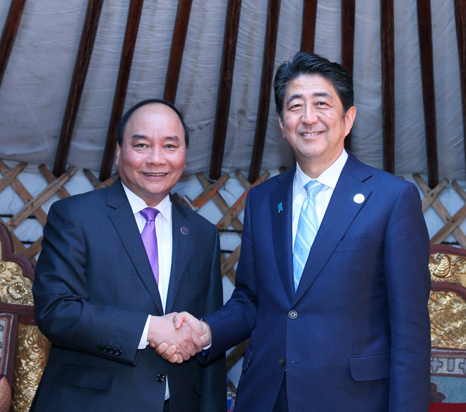 越南政府总理阮春福会见出席第十一届亚欧首脑会议的各国领导人 ảnh 9 越南政府总理阮春福会见出席第十一届亚欧首脑会议的各国领导人 ảnh 9