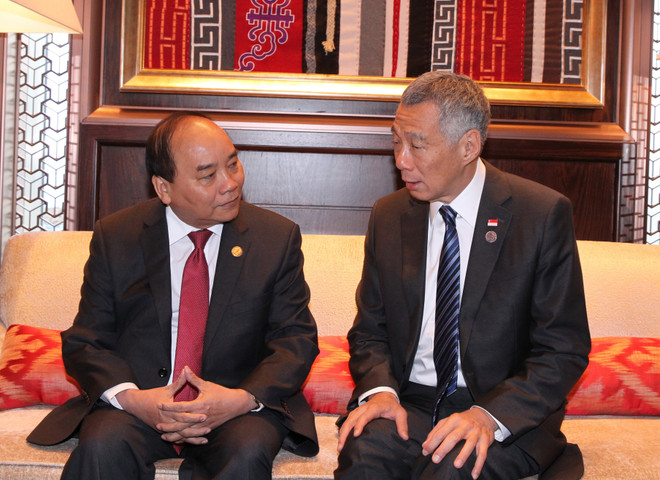 越南政府总理阮春福会见出席第十一届亚欧首脑会议的各国领导人 ảnh 3 越南政府总理阮春福会见出席第十一届亚欧首脑会议的各国领导人 ảnh 3