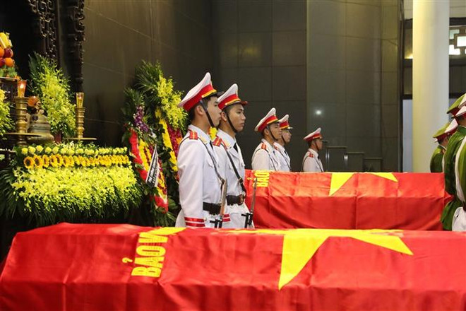 越共中央公安党委、公安部为在同心乡执行任务时牺牲的三名公安烈士隆重举行葬礼仪式 ảnh 1