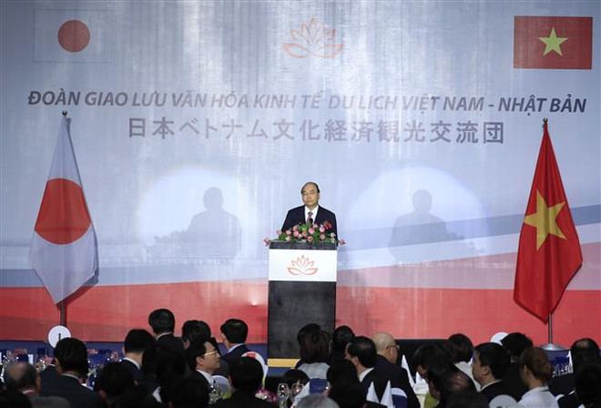 越南政府总理与日本自由民主党秘书长出席越日文化交流晚会 ảnh 2 越南政府总理与日本自由民主党秘书长出席越日文化交流晚会 ảnh 2