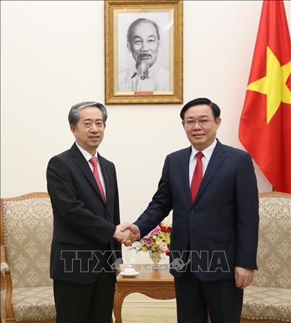 越南政府副总理王廷惠会见中国驻越大使熊波 ảnh 1 越南政府副总理王廷惠会见中国驻越大使熊波 ảnh 1