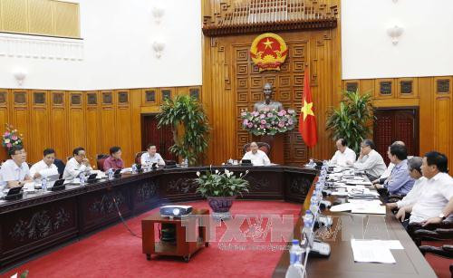 阮春福与总理经济咨询小组举行工作会谈 ảnh 1 阮春福与总理经济咨询小组举行工作会谈 ảnh 1