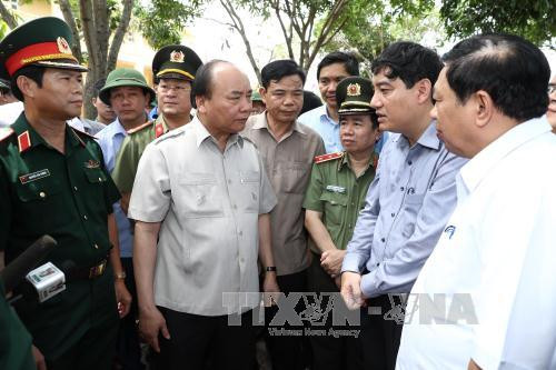 阮春福检查指导乂安省炉门县的第十号台风灾后恢复重建工作 ảnh 1 阮春福检查指导乂安省炉门县的第十号台风灾后恢复重建工作 ảnh 1