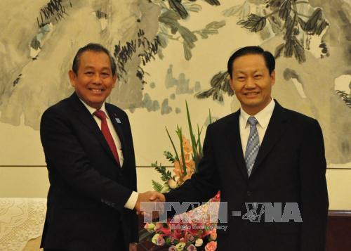 张和平会见中共广西壮族自治区党委书记彭清华和参观中关村科技园 ảnh 1