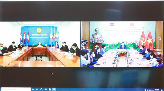 促进越共中央宣教部与柬埔寨人民党中央宣教委员会的合作 ảnh 2