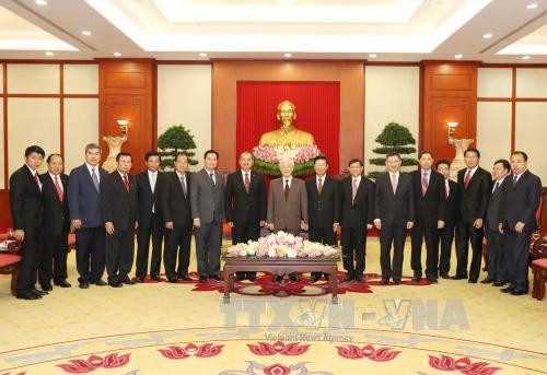 越共中央总书记会见老挝人民革命党代表团 ảnh 1