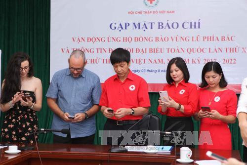 越南各中央机关纷纷捐款帮助西北地区洪水受灾群众 ảnh 2