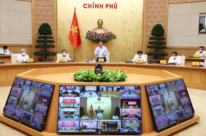 越南政府总理范明政主持召开全国新冠肺炎疫情防控工作视频会议 ảnh 1 越南政府总理范明政主持召开全国新冠肺炎疫情防控工作视频会议 ảnh 1