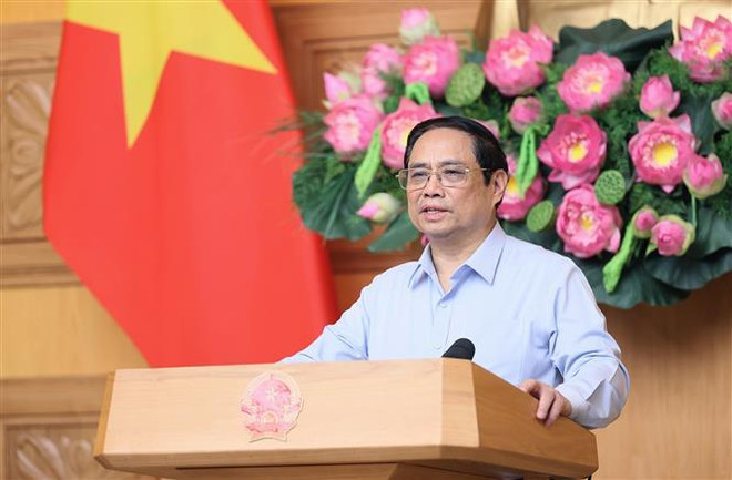 越南政府总理范明政会见南定省革命有功者典范代表团 ảnh 2 越南政府总理范明政会见南定省革命有功者典范代表团 ảnh 2