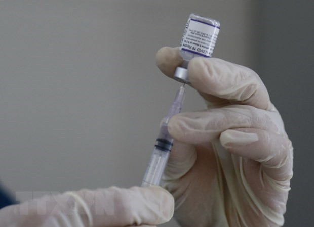 越南新冠疫情：3月21日全国新增确诊病例比新增治愈病例高出两倍 ảnh 1