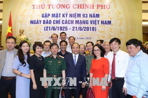 政府总理阮春福: 把握新媒体技术和新闻报道新方式 ảnh 1 政府总理阮春福: 把握新媒体技术和新闻报道新方式 ảnh 1