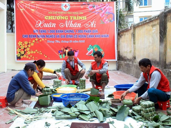 政府总理致信表彰越南红十字会的“为贫困者和橙毒剂受害者送温暖”运动 ảnh 1