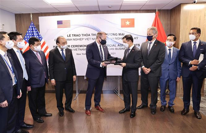 国家主席阮春福出席Vingroup集团与美国各合作伙伴之间的合作协议交换仪式 ảnh 1 国家主席阮春福出席Vingroup集团与美国各合作伙伴之间的合作协议交换仪式 ảnh 1