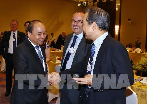 WEF ASEAN 2018：政府总理阮春福与全球各家集团领导进行对话 ảnh 2
