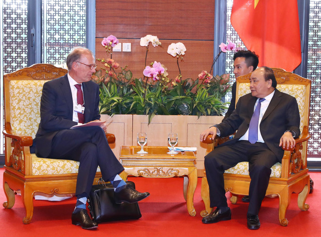 WEF ASEAN 2018:政府总理阮春福会见嘉士伯首席执行官郝瀚思 ảnh 1 WEF ASEAN 2018:政府总理阮春福会见嘉士伯首席执行官郝瀚思 ảnh 1