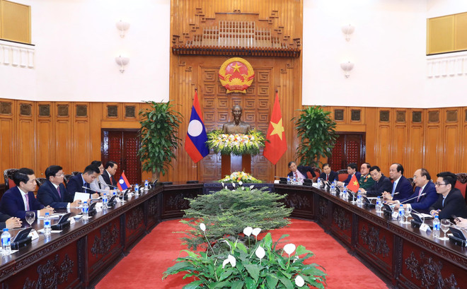 WEF ASEAN 2018: 政府总理阮春福会见老挝总理通伦·西苏里 ảnh 2 WEF ASEAN 2018: 政府总理阮春福会见老挝总理通伦·西苏里 ảnh 2