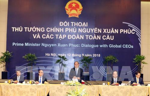 WEF ASEAN 2018：政府总理阮春福与全球各家集团领导进行对话 ảnh 1