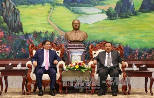 老挝人革党中央总书记、国家主席本扬•沃拉吉会见越共组织部高级代表团 ảnh 1 老挝人革党中央总书记、国家主席本扬•沃拉吉会见越共组织部高级代表团 ảnh 1