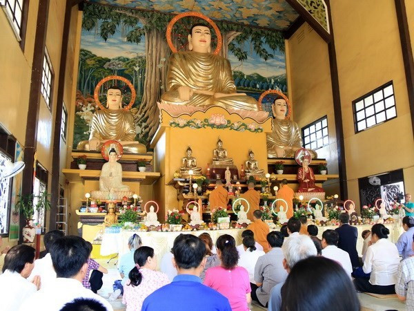 在老越南人举行新春祈福法会 祈求国泰民安 世界和平 ảnh 1 在老越南人举行新春祈福法会 祈求国泰民安 世界和平 ảnh 1
