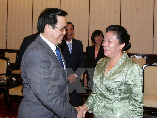 越老建交55周年：继续维护和推动越老关系发展 ảnh 1