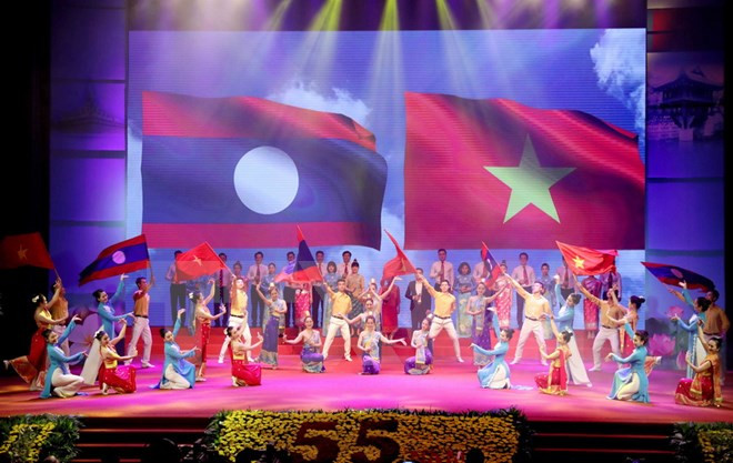 越老建交55周年暨《越老友好合作条约》签署40周年庆典在河内隆重举行 ảnh 2 越老建交55周年暨《越老友好合作条约》签署40周年庆典在河内隆重举行 ảnh 2