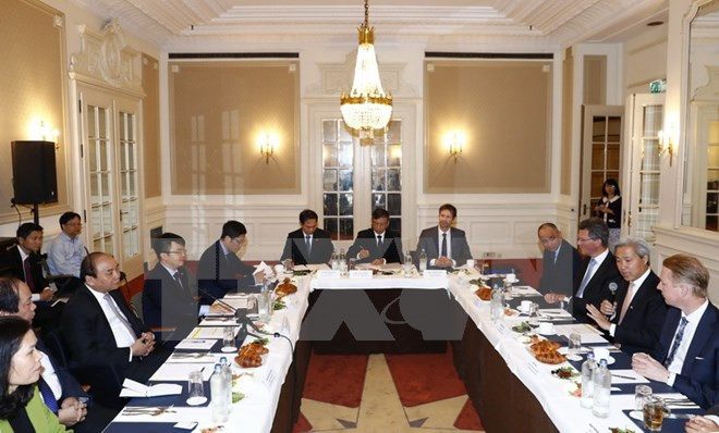 越南政府总理阮春福:越南政府将外国投资者的成功视为自己的成功 ảnh 2 越南政府总理阮春福:越南政府将外国投资者的成功视为自己的成功 ảnh 2