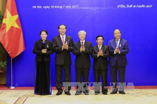 越南国家主席陈大光:愿为维护和继续培育越老特殊团结关系作出努力 ảnh 2  越南国家主席陈大光:愿为维护和继续培育越老特殊团结关系作出努力 ảnh 2