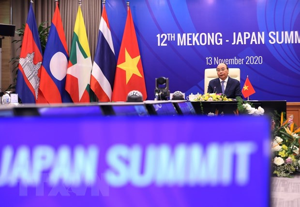 ASEAN 2020：第12届湄公河流域国家与日本峰会在河内举行 ảnh 1