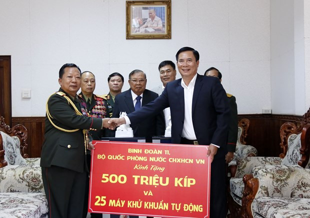 越南国防部协助老挝防控新冠肺炎疫情 ảnh 2 越南国防部协助老挝防控新冠肺炎疫情 ảnh 2